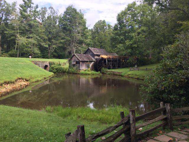 old mill by a pond
