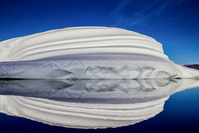 iceberg reflected in water