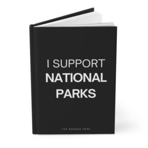 black hardcover journal with the words I support national parks on the cover